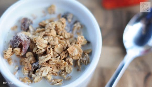 close up view of Salted Caramel Granola with spoon