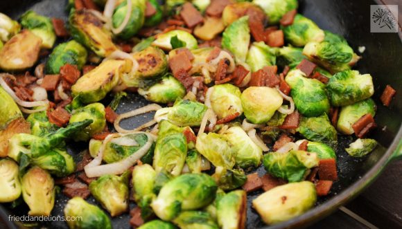vegan brussels sprouts with bacon in a skillet